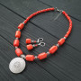 Намисто з натуральних коралів кольору лосось з підвіскою "Квітка сонця"
