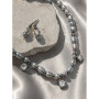 Кольє і сережки з сріблястих перлин